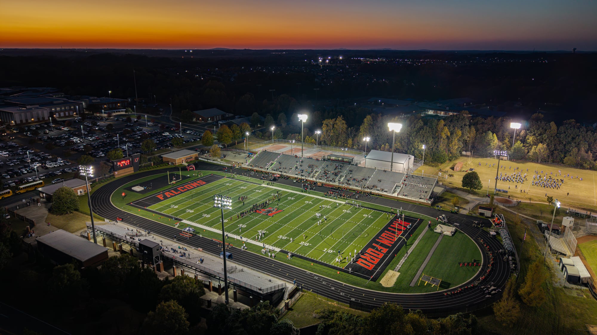 Nation Ford High School football stadium before a game at dusk